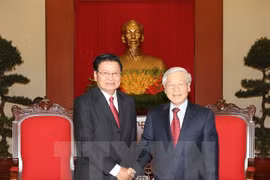 越共中央总书记阮富仲会见老挝总理通伦（图片来源：越通社）