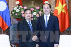 越南国家主席陈大光会见老挝国会副主席宋潘•平坎米（图片来源：越通社）