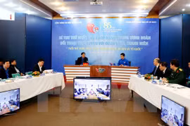 胡志明共青团中央书记处第一书记阮得荣与青年进行在线对话（图片来源：越通社）