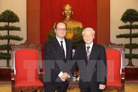 越共中央总书记阮富仲会见法国总统弗朗索瓦•奥朗德（图片来源：越通社）