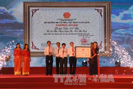 阿巢祠国家级非物质文化遗产授证仪式场景（图片来源：越通社）