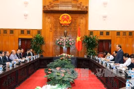 交谈场景（图片来源：越通社）