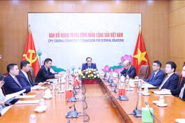 黎怀忠同志与阿尔及利亚民族解放阵线党领导举行线上会谈