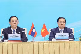 越老两国总理共同主持越老投资合作会议