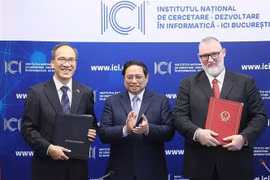 越南政府总理范明政走访罗马尼亚国家信息学研究与发展研究所