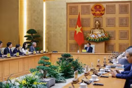 会议场景。图自越通社