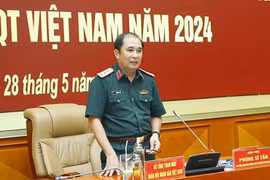 越南人民军副总参谋长冯士晋上将发表讲话。图自越通社