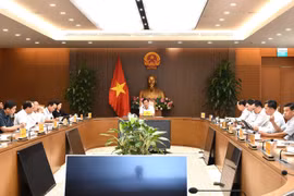 会议场景。图自越通社