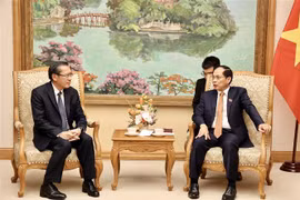 会见场景。图自越通社
