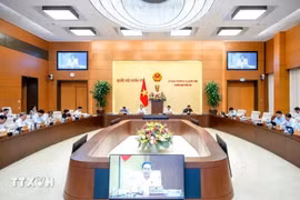 会议场景。图自越通社