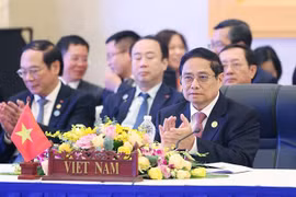 越南政府总理范明政出席会议。图自越通社