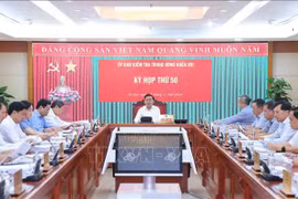 会议场景。图自越通社