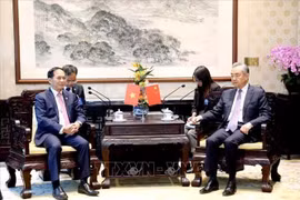 越南外交部部长裴青山会见中国外交部部长王毅。图自越通社 