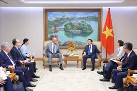 会见场景。图自越通社