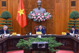 会议场景。图自越通社