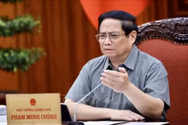 越南政府总理范明政在会议上发言。图自越通社