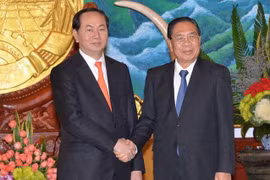 老挝人民革命党中央总书记、国家主席朱马里·赛雅颂会见越南公安部长陈大光大将