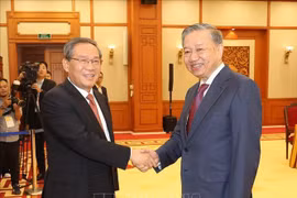 越共中央总书记、国家主席苏林会见中国国务院总理李强。图自越通社