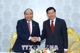 越南政府总理阮春福在老挝开展的系列活动（组图）