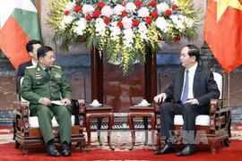 越南国家主席陈大光会见缅甸国防军总司令敏昂莱(图片来源：越通社）