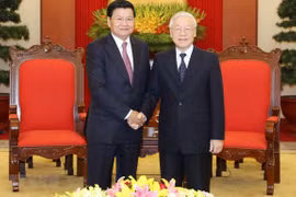 越共中央总书记、国家主席阮富仲访老有助于不断培育越老两国特殊关系