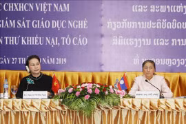越南与老挝两国国会专题研讨会有助于提高依法治理国家的效果