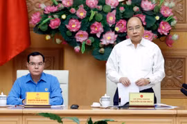阮春福出席政府与劳动总联合会协调工作会议