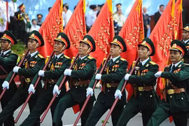 社论：在新形势下激发捍卫祖国的力量