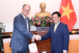 越南政府副总理范平明会见德国驻越大使克里斯蒂安·伯杰