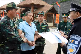 越中两国警方配合逮捕通缉犯