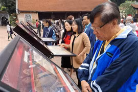 “阮朝木板中的国徽和越国京都”展览会在文庙国子监举行