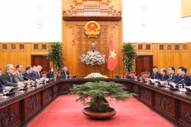 越南政府副总理范平明会见美国企业代表团