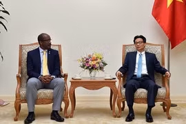 越南政府副总理武德儋会见塞舌尔副总统文森特·梅里顿