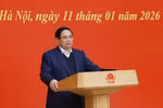 越共中央政治局委员、政府党委书记、政府总理范明政在会议上发表讲话。图自越通社