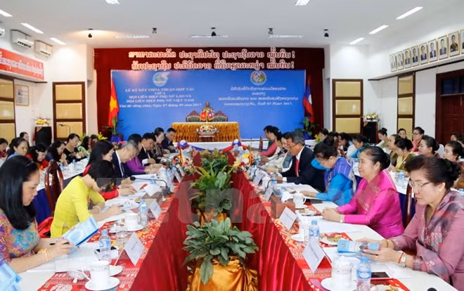 越老建交55周年：越老两国妇联加强合作 ảnh 1