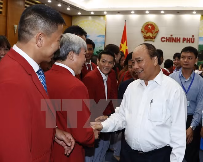 政府总理阮春福会见第29届东南亚运动会越南体育代表团各成员 ảnh 3