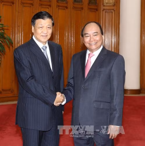 阮春福和阮氏金银会见中共中央政治局常委、中央书记处书记刘云山 ảnh 1