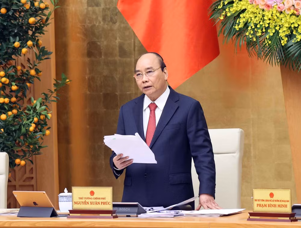 越南政府总理阮春福：更加及时地开展新冠疫苗接种工作 ảnh 1
