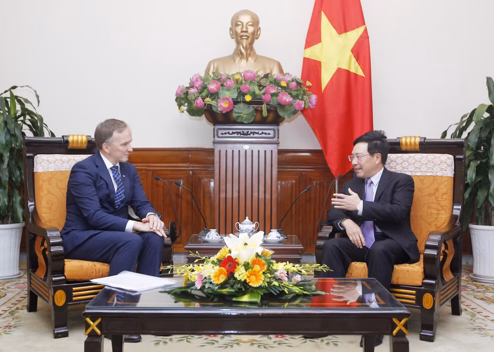  政府副总理兼外长范平明会见拉脱维亚国务秘书安德烈斯·贝德高 ảnh 1