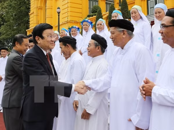 越南国家主席会见高台教圣会人士 ảnh 1