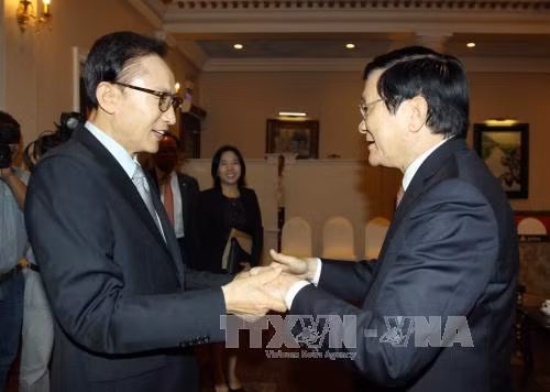 越南国家主席张晋创会见韩国前总统李明博 ảnh 1
