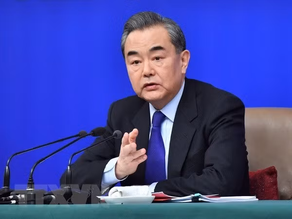 越南政府副总理兼外长范平明致电祝贺中国国务委员兼外交部长王毅 ảnh 1