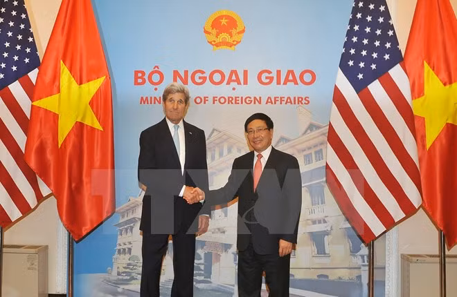越南政府副总理兼外长范平明与美国国务卿约翰·克里举行会谈 ảnh 1 越南政府副总理兼外长范平明与美国国务卿约翰·克里举行会谈 ảnh 1