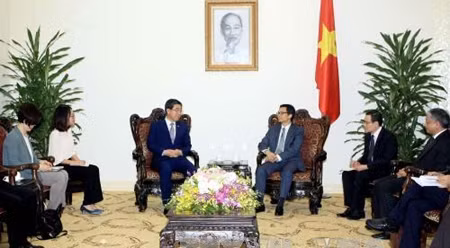 越南政府副总理武德儋会见韩国雇佣劳动部长官李基权 ảnh 1