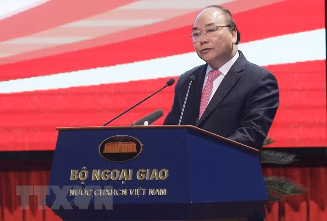 阮春福总理：外交工作应以企业为核心 ảnh 1