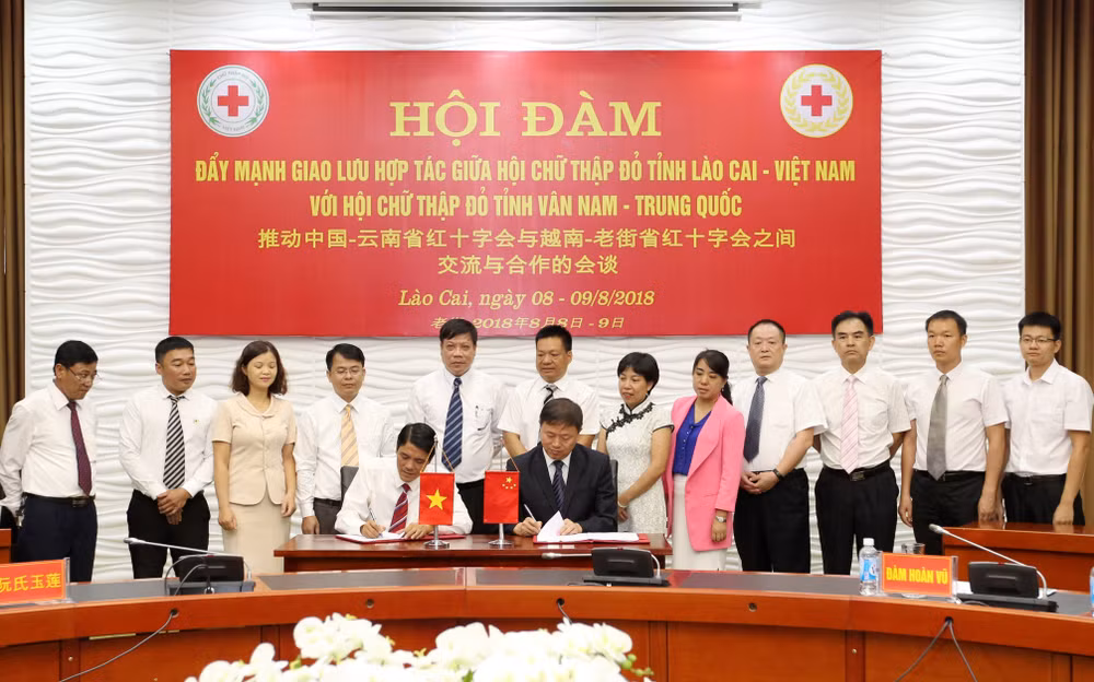 越南老街省与中国云南省建立友好合作关系架起人道领域桥梁 ảnh 1
