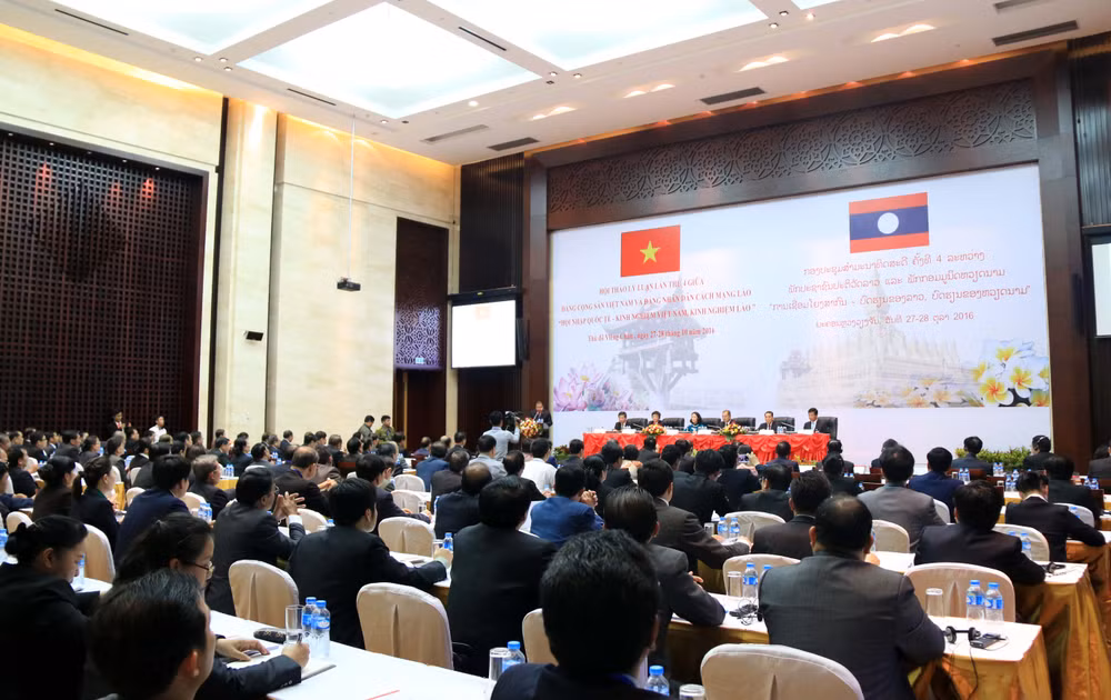 越共中央民运部同老挝建国阵线加强合作 ảnh 1