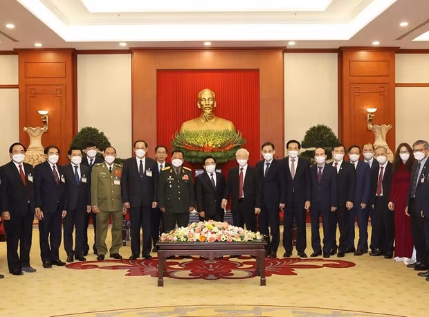 越共中央总书记阮富仲会见老挝政府总理潘坎·维帕万 ảnh 2