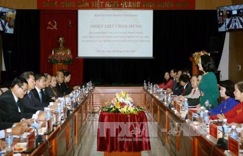 越老加强合作交流 互相分享群众工作领域的经验 ảnh 1