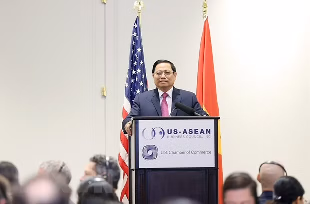 越南政府总理范明政与美国企业界代表会面 ảnh 1